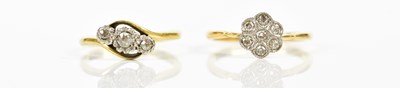 Lot 2423 - An 18ct yellow gold diamond set floral dress...
