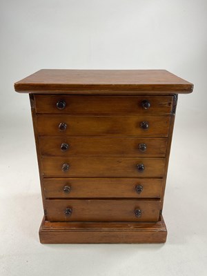 Lot 667 - A six drawer specimen cabinet containing...