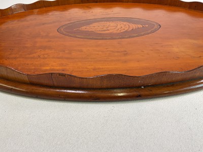 Lot 10 - An Edwardian satinwood twin handled tray with...