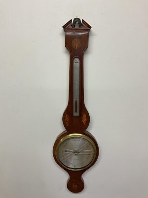 Lot 671 - A 19th century mahogany and inlaid wheel...
