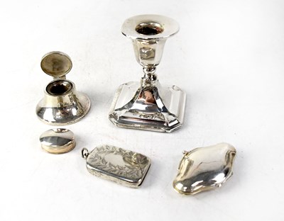 Lot 633 - A hallmarked silver squat candlestick