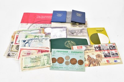 Lot 2385 - A collection of coins in packs including Isle...
