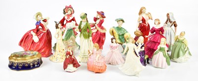 Lot 1519 - ROYAL DOULTON; a collection of figures...