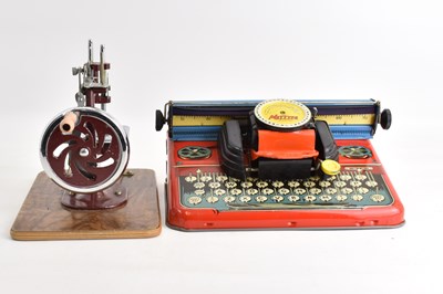 Lot 667 - A boxed Mettype Junior child's typewriter with...