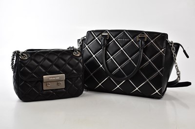 Lot 743 - MICHAEL KORS; an unused black soft quilted...