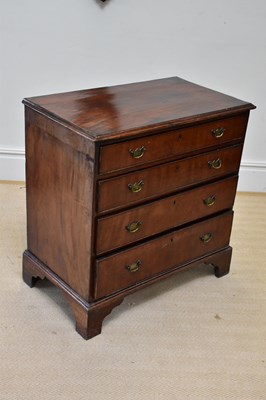 Lot 77 - A George III mahogany chest of four long...