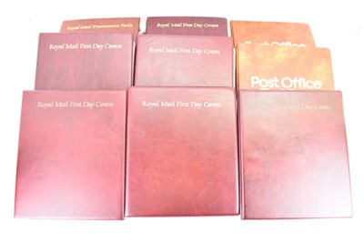 Lot 606 - Nine folders of first day covers, to include...