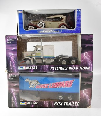 Lot 888 - Five boxed vehicles and sets comprising a...