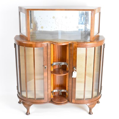 Lot 10 - A 1950s mahogany veneered cocktail cabinet,...