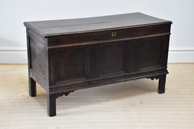 Lot 10 - An 18th century oak three panel coffer, on...