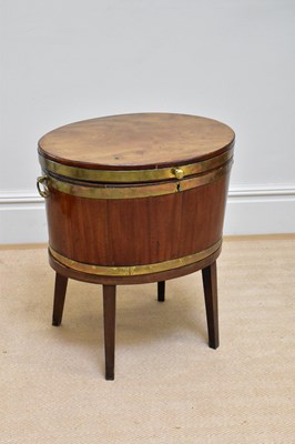 Lot 67 - A George III brass bound mahogany cellarette,...