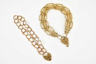 Lot 423 - A 9ct yellow gold gate link bracelet with 9ct...