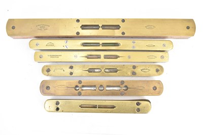 Lot 374 - Six wood and brass vintage spirit levels...