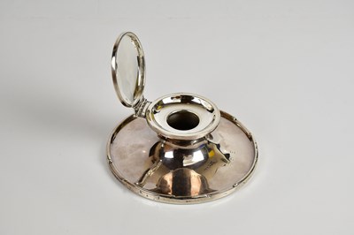 Lot 2193 - A hallmarked silver weighted capstan inkwell,...
