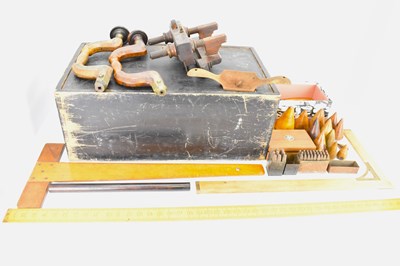 Lot 373 - A wooden toolmaker's chest with internal...