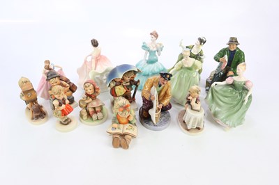 Lot 2521 - ROYAL DOULTON; a collection of seven figures...
