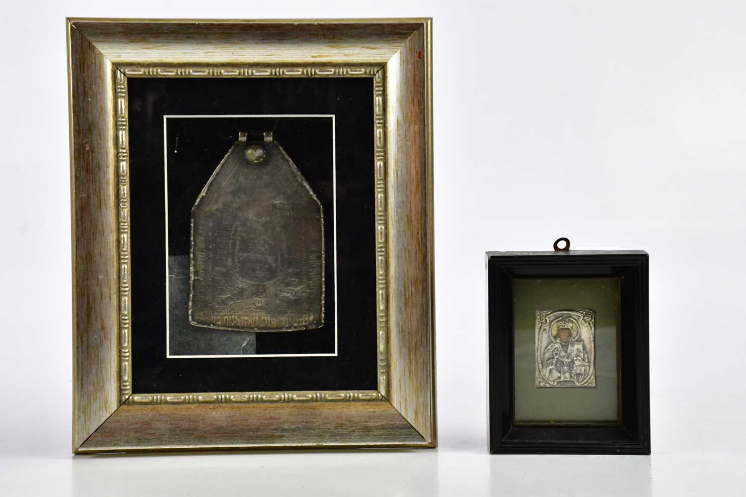 Lot 2238 - A white metal Hebrew plaque, framed and glazed,...