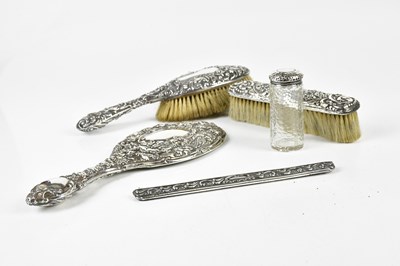 Lot 2180 - A matched hallmarked silver four piece...