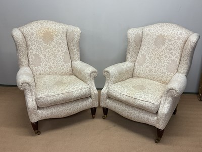 Lot 677 - Two cream upholstered arm chairs, height 92cm,...