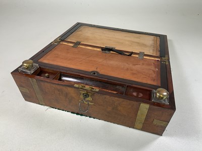 Lot 700 - A burr walnut writing slope with brass...