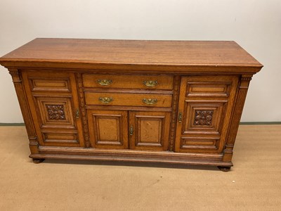 Lot 713 - An oak sideboard, height 100cm, width 182cm,...