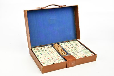 Lot 1618 - A vintage bone and bamboo mahjong set in...