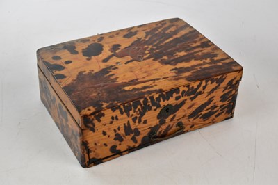 Lot 2595 - A Japanese tortoiseshell effect lacquered...