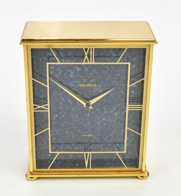 Lot 1432 - JAEGER LE COULTRE; a brass cased battery...