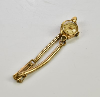 Lot 600 - LONGINES; a lady's vintage 9ct gold wristwatch,...
