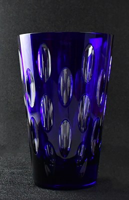 Lot 461 - FABERGÈ; a large blue glass vase with clear...