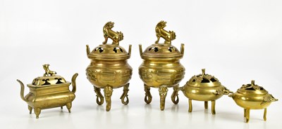 Lot 2589 - A pair of Chinese brass koros and covers each...