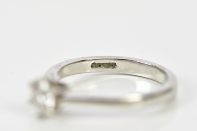 Lot 27 - A platinum and diamond solitaire ring, the six...