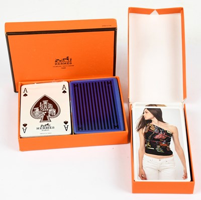 Lot 754 - HERMES; a set with two packs of playing cards...