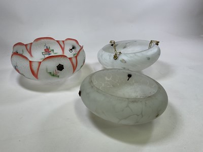 Lot 583 - Three glass ceiling shades circa 1940, one...