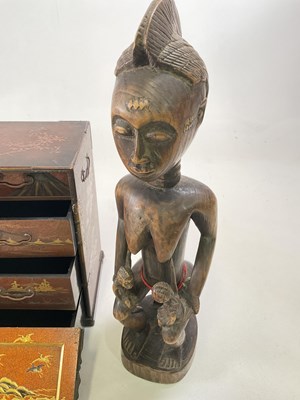 Lot 15 - A Japanese table top cabinet and three wooden...