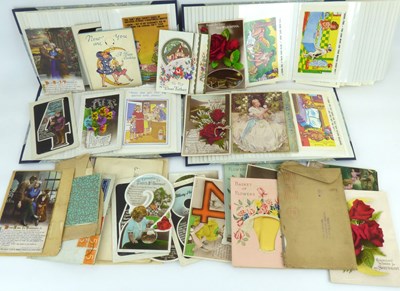 Lot 590 - Two albums of saucy seaside postcards