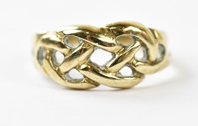 Lot 2434 - A small 9ct yellow gold Celtic design ring,...