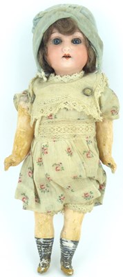 Lot 236 - A 19th century small German porcelain and composite doll