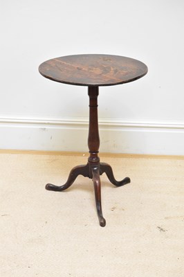 Lot 1335 - A 19th century oak tilt-top tripod table,...