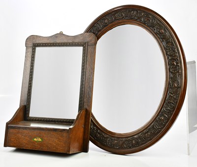 Lot 1336 - A carved oak oval wall mirror, 50 x 57cm, and...