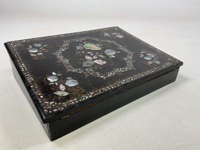 Lot 679 - A Victorian mother of pearl inlaid black...