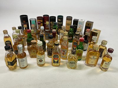 Lot 719 - WHISKY; a collection of whisky miniatures.