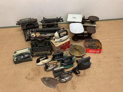 Lot 133 - A collection of typewriters, scales including...