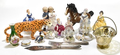 Lot 597 - A group of ceramics figures including two...