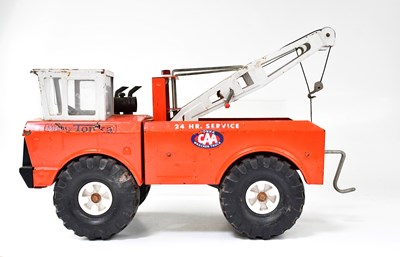Lot 632 - TONKA; a Mighty tin-plate recovery truck with...