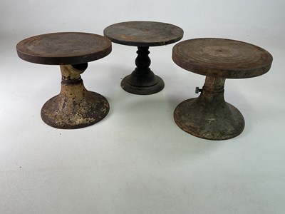 Lot 601 - Three early 20th century cast iron potters...