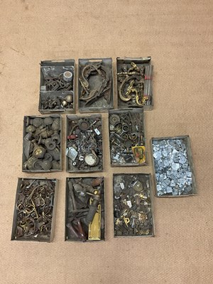 Lot 611 - A quantity of brass furniture fittings...