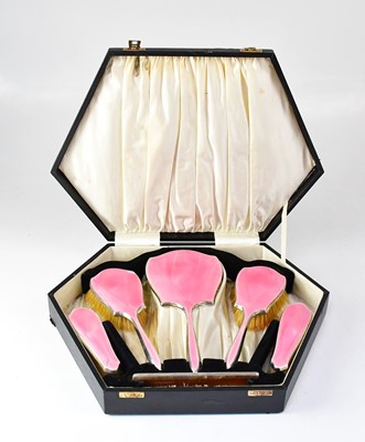 Lot 945 - A George V hallmarked silver and pink...