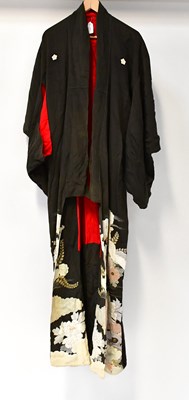 Lot 163 - A vintage green-black kimono decorated with...
