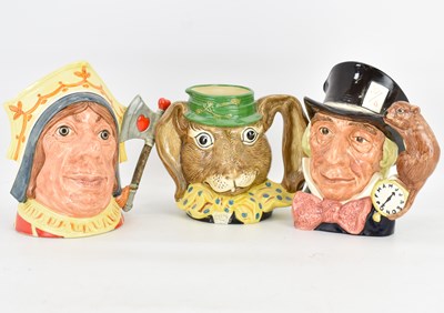 Lot 287 - ROYAL DOULTON; three Alice in Wonderland...